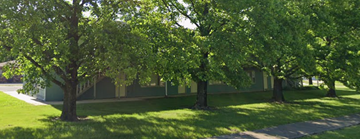 Mount Zion apartment for rent - A row of trees in front of a building.