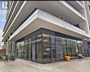 Toronto (Niagara) condo for rent - A modern building with the number 30 on it.