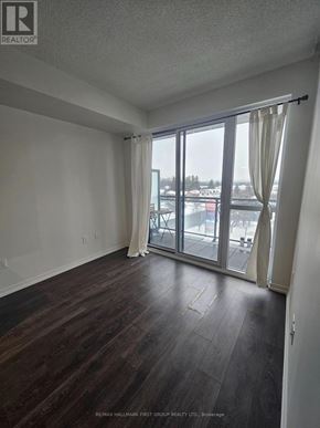 Toronto (Bayview Woods-Steeles) condo for rent - A stainless steel refrigerator in a kitchen.
