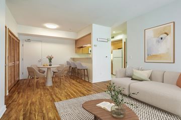 Santa Monica apartment for rent - A living room with a couch, chairs, and a coffee table.
