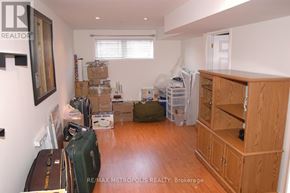 Waterloo townhouse for rent - A room with a lot of boxes and items scattered around.