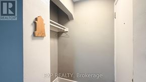 Ottawa multi-family for rent - A brokerage office with a wooden sign on the wall.