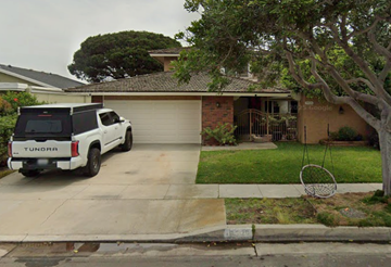 Torrance house for rent - A white Tundra truck is parked in front of a house.