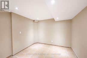 Markham (Rouge River Estates) house for rent - A room with beige walls and a tiled floor.