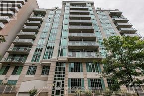 Ottawa condo for rent - A tall building with many windows and balconies is shown.
