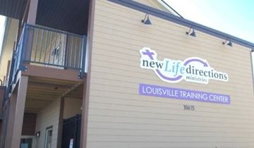 Louisville apartment for rent - A building with a sign that says New Life Directions Louisville Training Center.