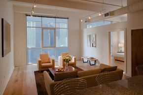 Baton Rouge apartment for rent - a living room with couches and chairs and a table