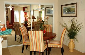 Orange City apartment for rent - A dining room with a table and chairs.