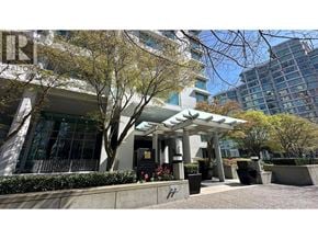 Vancouver apartment for rent - A building with a sign that says "REALTOR" in front of it.