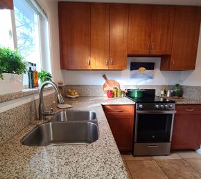 Menlo Park apartment for rent - a kitchen with granite counter tops and a sink