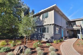 Belmont apartment for rent - the exterior of a house with a walkway in front of it