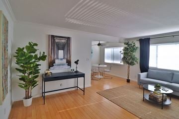 Belmont apartment for rent - a living room with a couch and a table