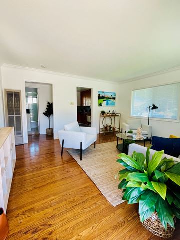 Palo Alto apartment for rent - a living room with a hard wood floor and white furniture