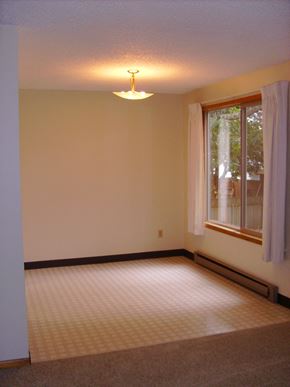 Gresham apartment for rent - an empty room with a window and a carpeted floor