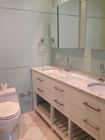 New York apartment for rent - a bathroom with a sink and a toilet