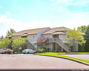 Bend apartment for rent - a house with a car parked in front of it