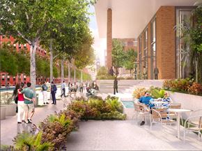 Hoboken apartment for rent - A group of people are walking and sitting in a courtyard with trees and plants.
