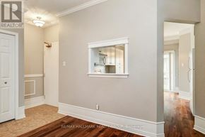 Ottawa condo for rent - A room with a window and a door.