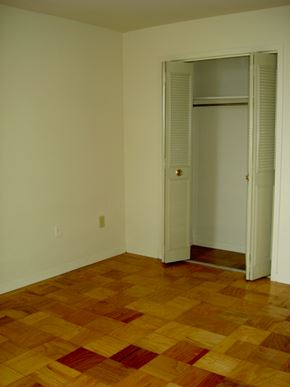 Falls Church apartment for rent - an empty room with a wooden floor and a closet
