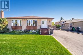 Brampton (Avondale) house for rent - A house with a lawn in front of it.