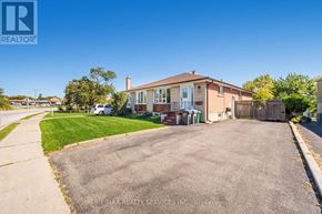 Brampton (Avondale) house for rent - A house with a driveway in front of it.