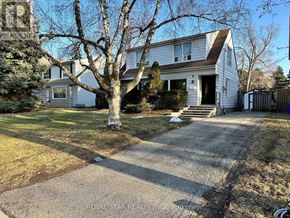 Toronto (Lansing-Westgate) house for rent - A white house with a tree in front of it.