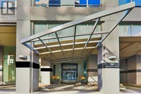 Toronto (Waterfront Communities) condo for rent - The entrance to a building with a sign that says "Max Realtor".