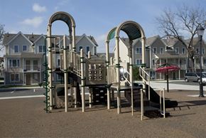 Staten Island apartment for rent - a playground in front of a row of houses