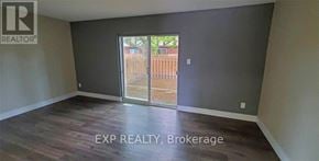 St. Catharines (Carlton/Bunting) townhouse for rent - A room with EXP REALTY, Brokerage written on the floor.