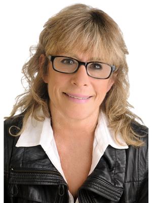 Judy Clark, RE/MAX ABSOLUTE REALTY INC.