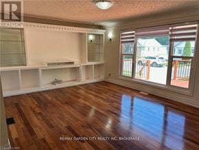 Welland (Lincoln/Crowland) house for rent - A room with wooden floors and white shelves.