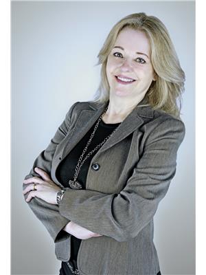 Sandra Crumb, RE/MAX GARDEN CITY REALTY INC, BROKERAGE