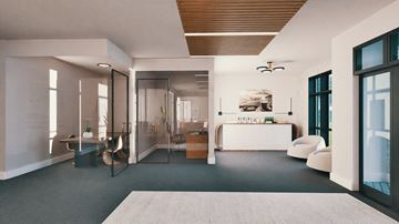 Madison apartment for rent - A modern living room with a white sofa and a glass wall.