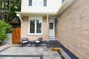 Mississauga (Meadowvale) house for rent - A house with a white door and a brick wall.