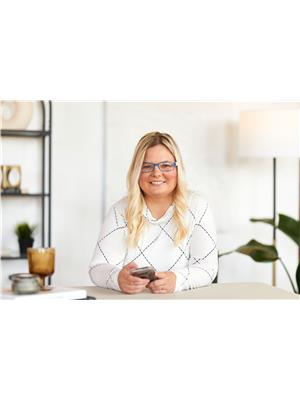Alla Sharma, Re/Max Twin City Realty Inc