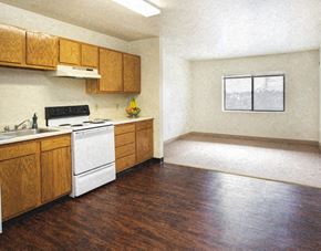 North Versailles apartment for rent - an empty kitchen with a stove and a sink