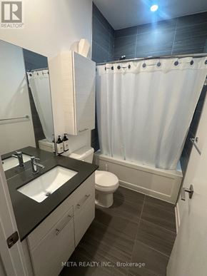 Gravenhurst (Muskoka (S)) condo for rent - A bathroom with a sink, toilet, and shower.