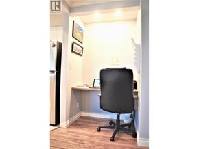 Richmond apartment for rent - A black chair is in front of a laptop on a desk.