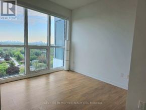 Toronto (Bayview Village) condo for rent - A room with a view of the city through large windows.