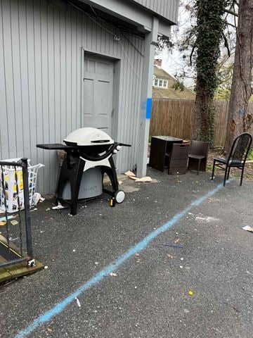 Poughkeepsie apartment for rent - A BBQ grill is leaning against a building.