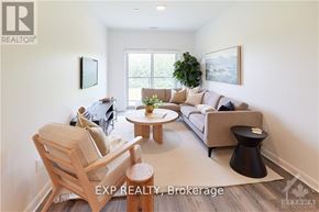Ottawa condo for rent - A living room with a couch, chair, and coffee table.