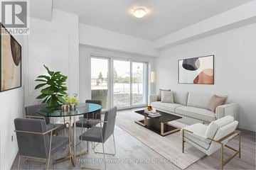 North Dumfries other for rent - A modern living room with a glass table and grey chairs.