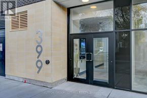 Ottawa condo for rent - The image shows the front of a building with the number 309 on it.