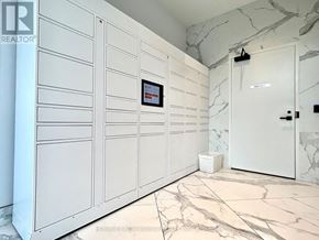 Toronto (Clanton Park) condo for rent - A bathroom with marble flooring and white cabinets.