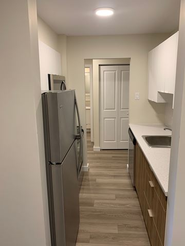 Halifax apartment for rent - A kitchen with a refrigerator and a sink.