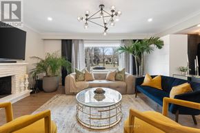 Richmond Hill (South Richvale) house for rent - A living room with a fireplace and a large window.