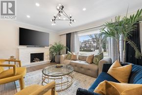 Richmond Hill (South Richvale) house for rent - A living room with a fireplace and a television.