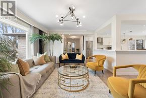 Richmond Hill (South Richvale) house for rent - A well-lit living room with a beige sofa, yellow armchair, and a glass coffee table.