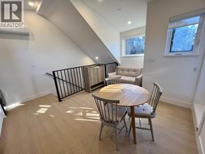 Vancouver house for rent - A dining room with a table and chairs is shown.