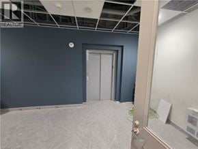 Woodstock apartment for rent - A room with a door and a wall with a hole in it.